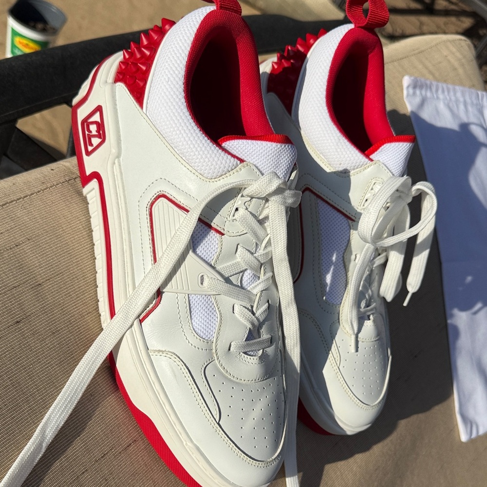 Christian Louboutin Astroloubi low-top sneaker in white and Loubi red calf lthr